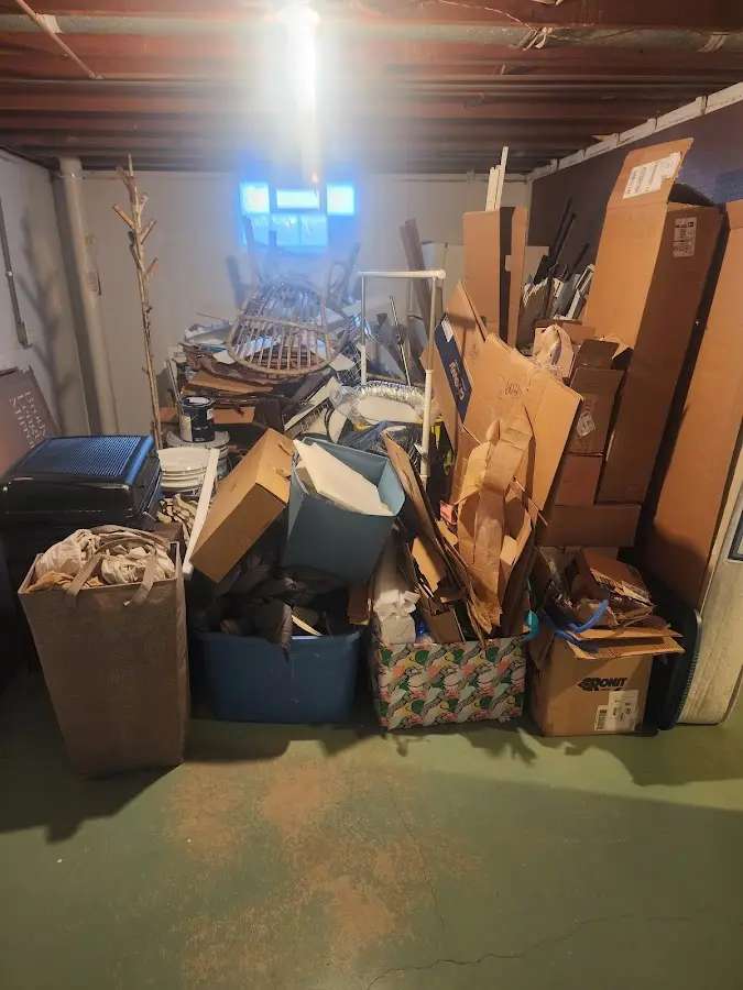 Roll-off dumpster container at job site for 2 Yard Dumpster Rental in Mooresville